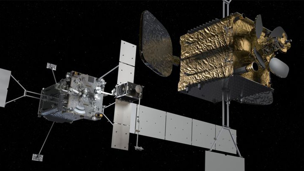 Image of the MRV (rear), with an MEP (small cube in the centre) held in its robotic arm, approaching a client’s satellite (right foreground)