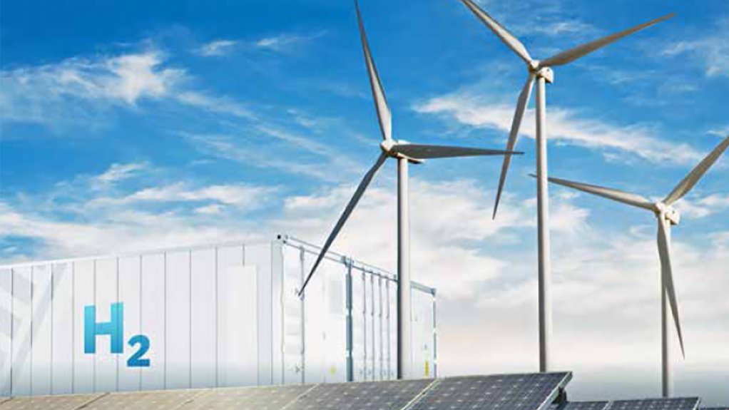 A photo of wind turbines, solar panels and hydrogen fuel cells