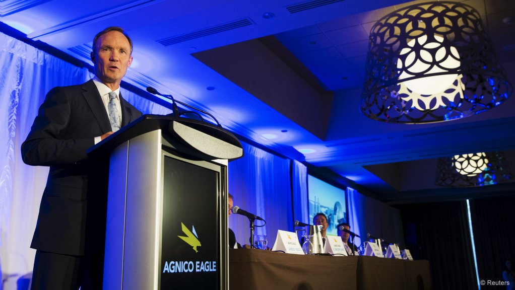 An image of Sean Boyd speaking at an event.