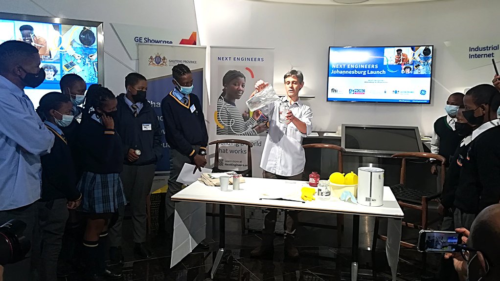 An image of school students watching an engineering demonstration during GE's Next Engineers launch 