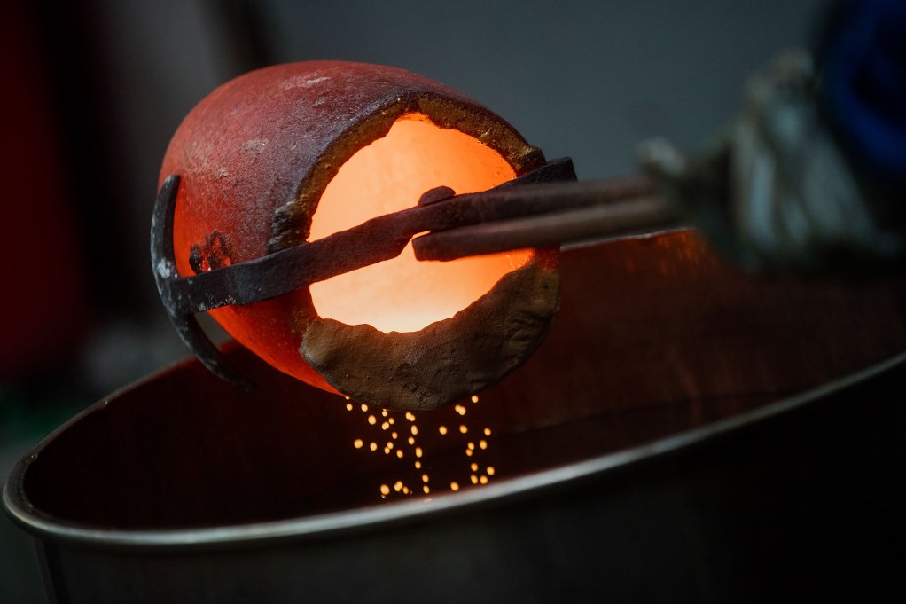 An image of gold being poured