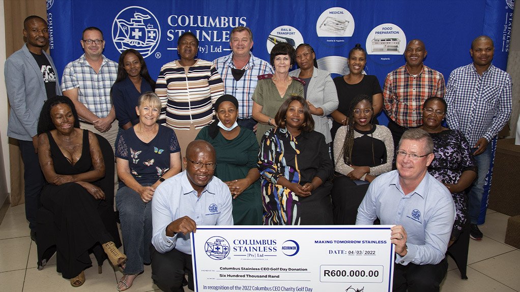 Columbus Stainless CEO, Johan Strydom and General Manager, HR & Corporate Affairs, Jo Mabhena with the representatives of the charity organisations