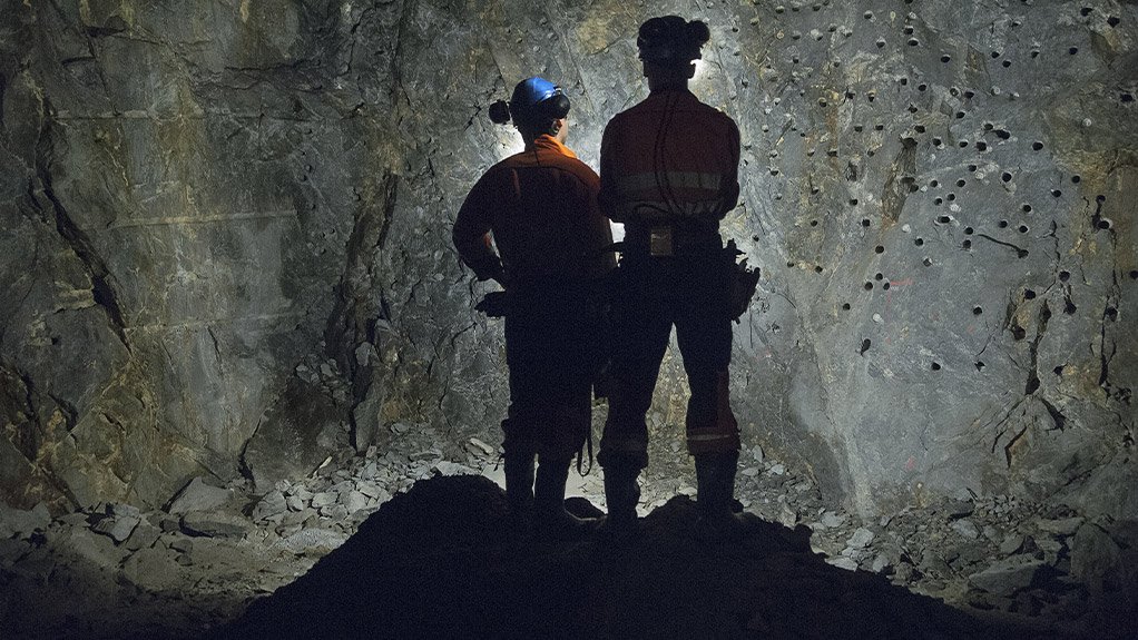 Image of miners working underground