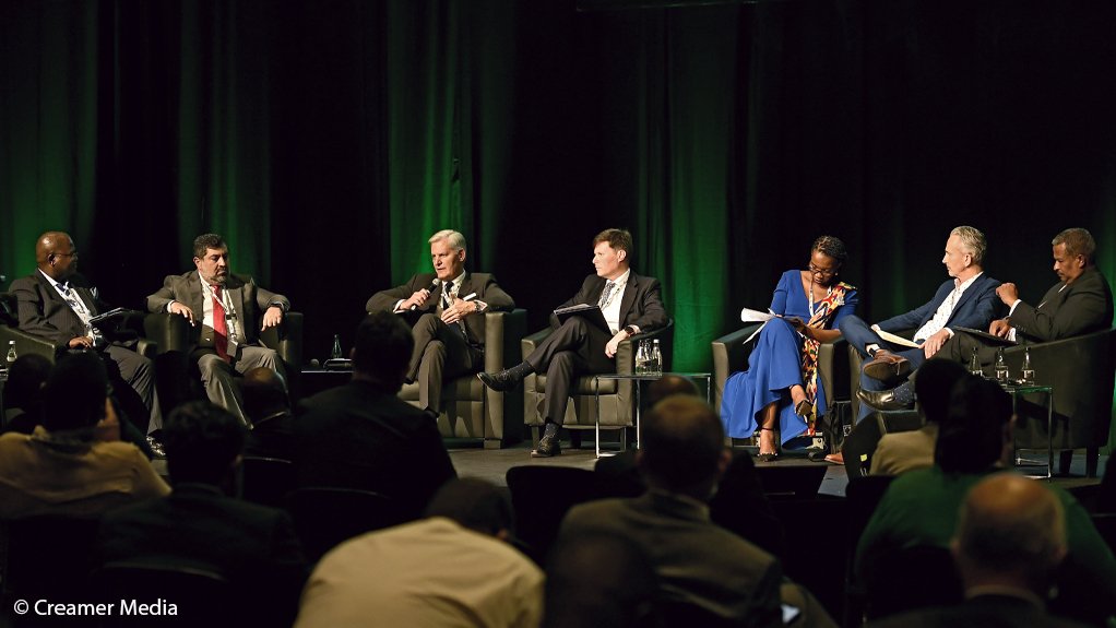 Eskom CEO Andre de Ruyter (with mic) speaks during an energy transition breakaway session at the South Africa Investment Conference 2022