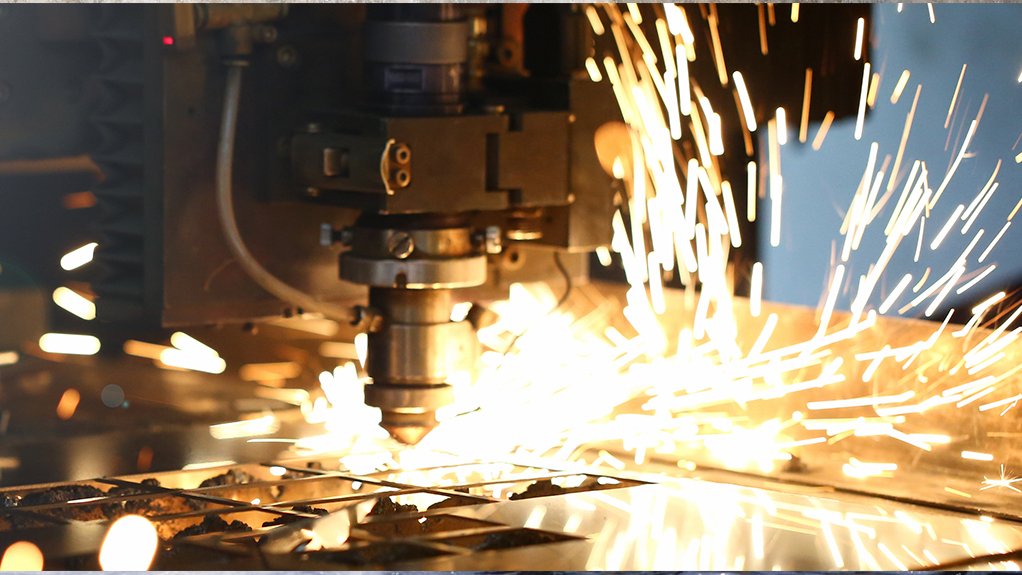 An image depicting sparks flying out a machine head 