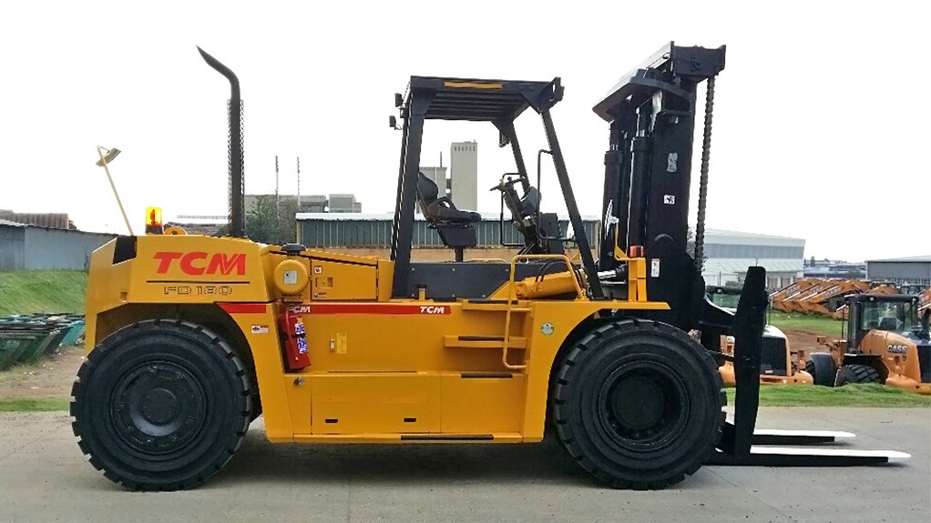 A side view of a yellow Criterion TCM forklift which is used to lift heavy loads