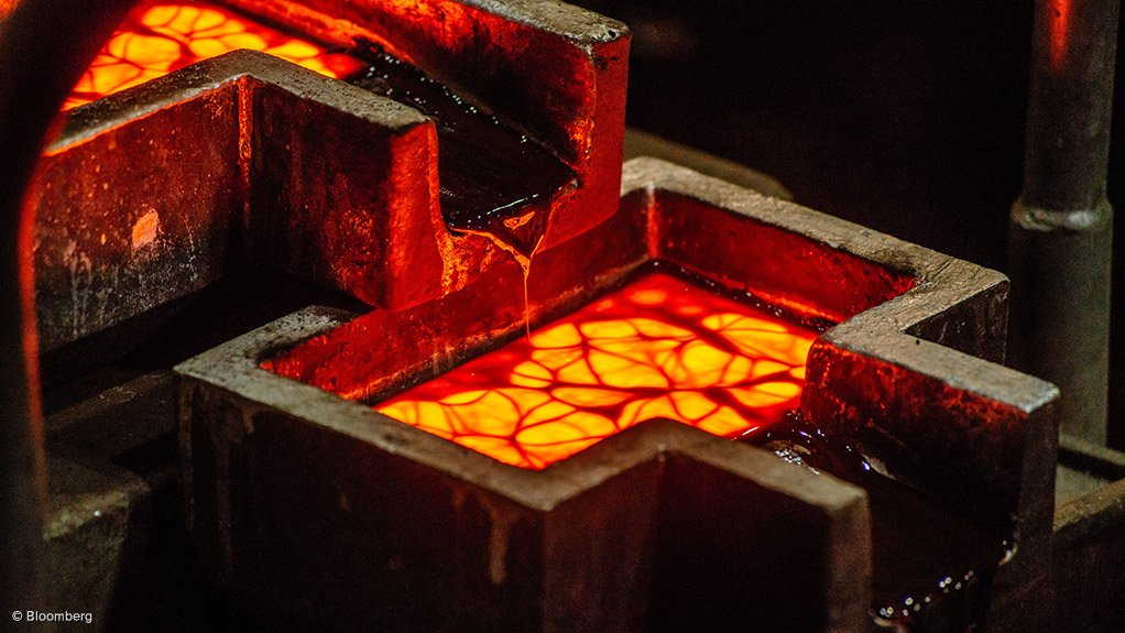 An image of gold being poured