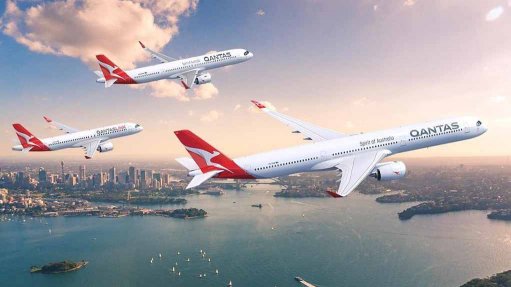 An artist’s impression of an A350-1000 (right foreground), an A321XLR (top centre) and an A220 (left, trailing) in Qantas livery