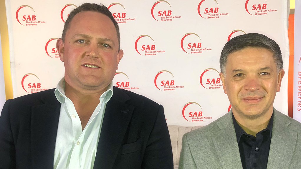 SAB CEO Richard Rivett-Carnac and AB InBev CEO Michel Doukeris