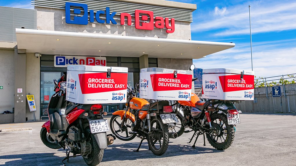 Pick n Pay delivery bikes parked in front of a store