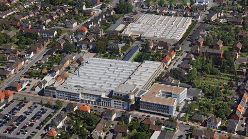 An image depicting an aerial view of the BEUMER offices