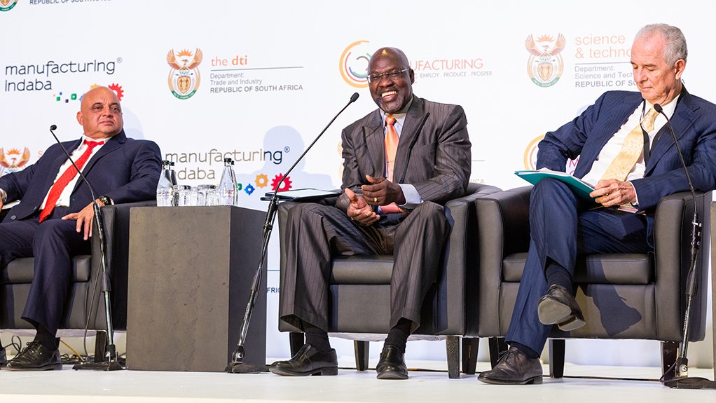 AN image of panelists at the Manufacturing Indaba