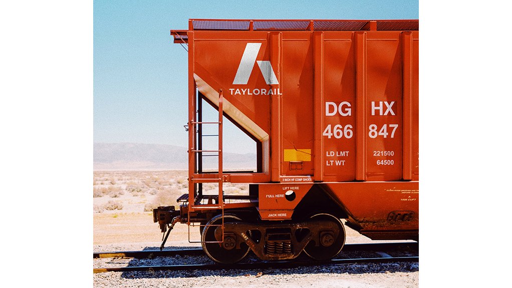 An image depicting Taylorail's red rail wagon