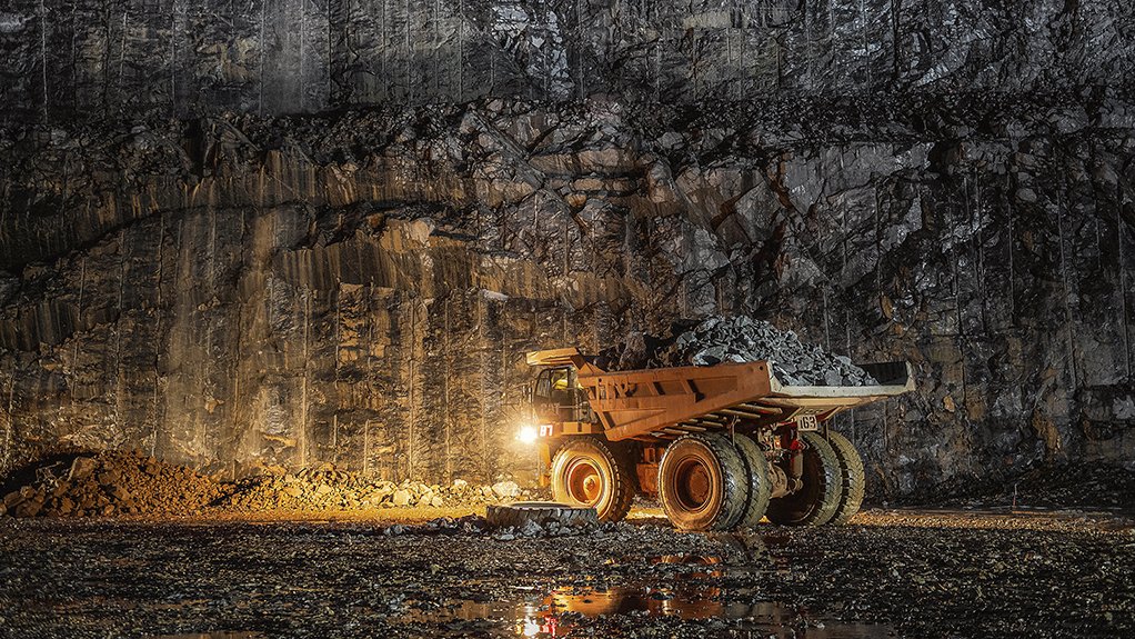 An image of a truck in a pit at the Damang mine