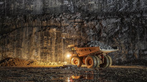 An image of a truck in a pit at the Damang mine
