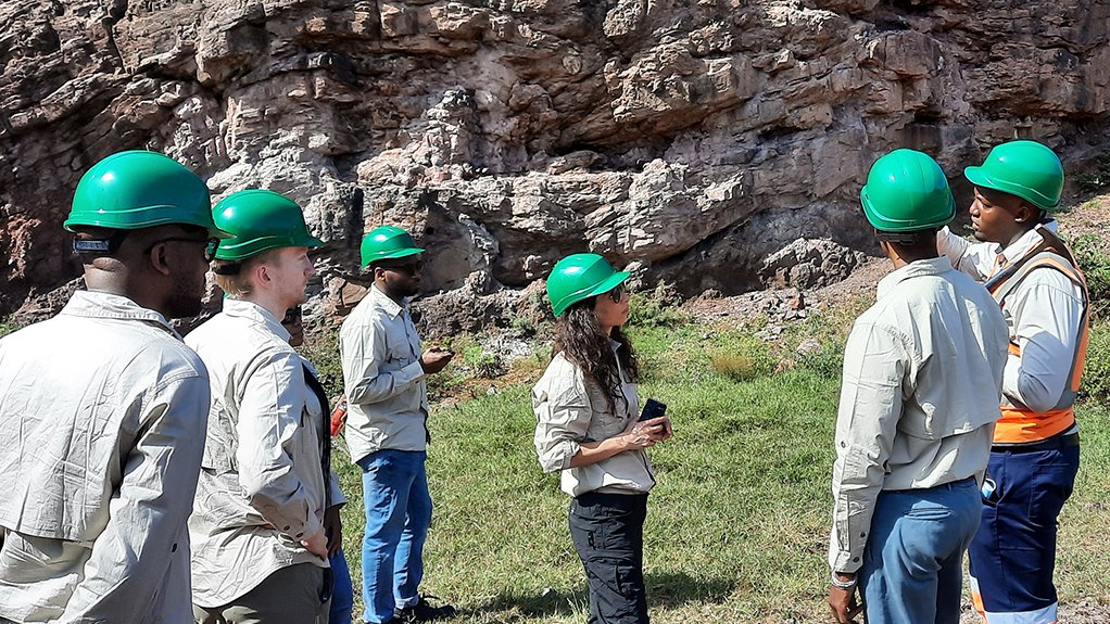 An image of investors visiting the K.Hill mine site