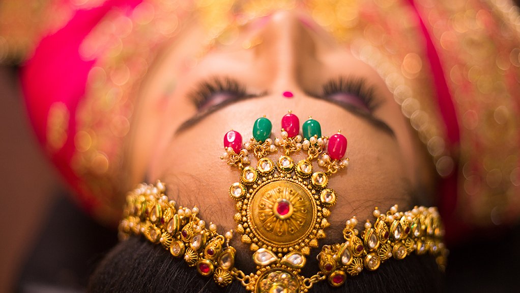 indian woman with gold head dress