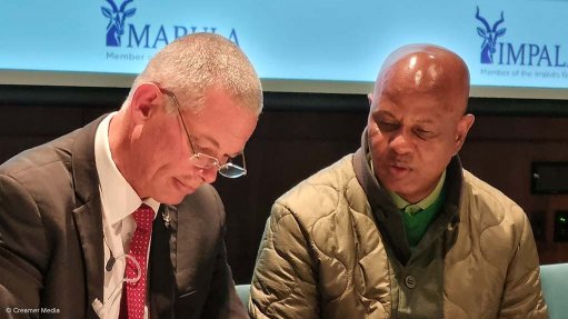 Implats, AMCU sign five-year wage deal