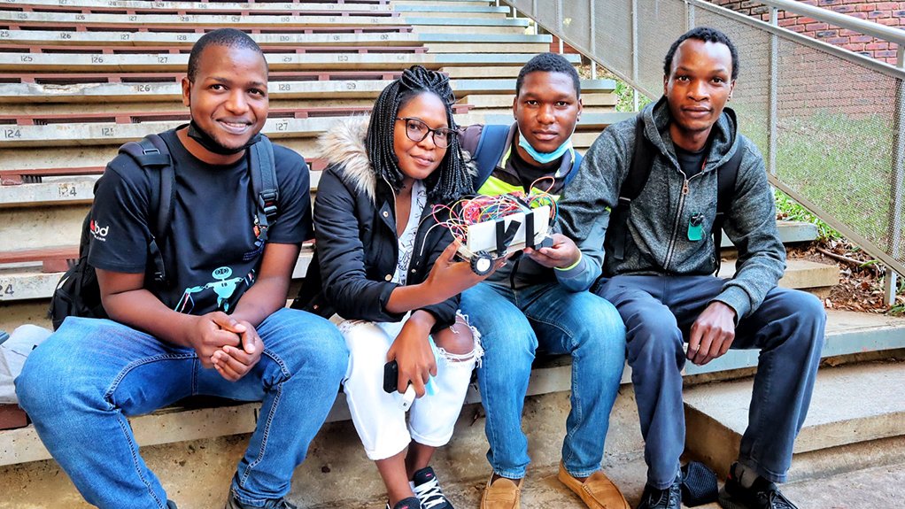 Image of students and a robot, to illustrate TUKS Robot Race Day