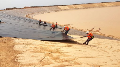 DAM DESIGN The tailings facility is designed to stack tailings 15 m high with an inward angle of not more than 20°