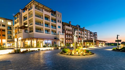 An image depicting luminaries installed by Regent Lighting Solutions in the outdoor spaces of the Steyn City Estate, in Midrand at dusk