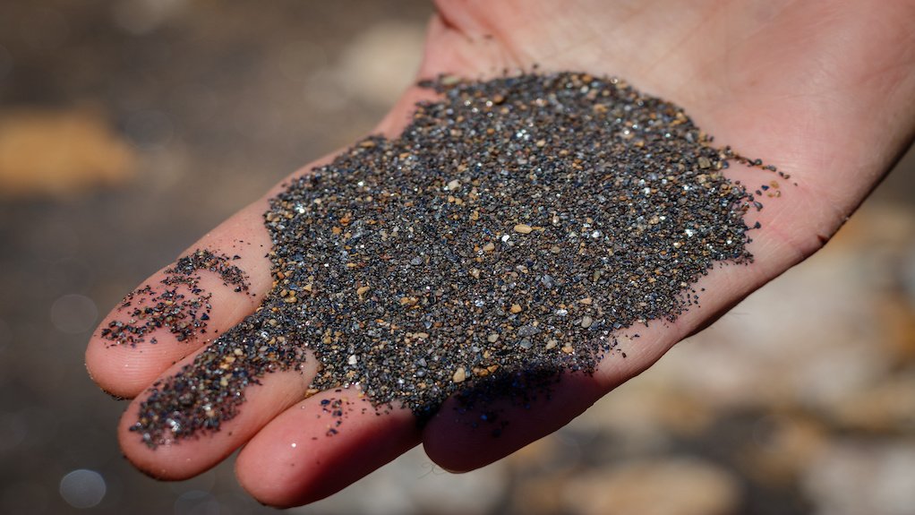 Image of mineral sands in hand