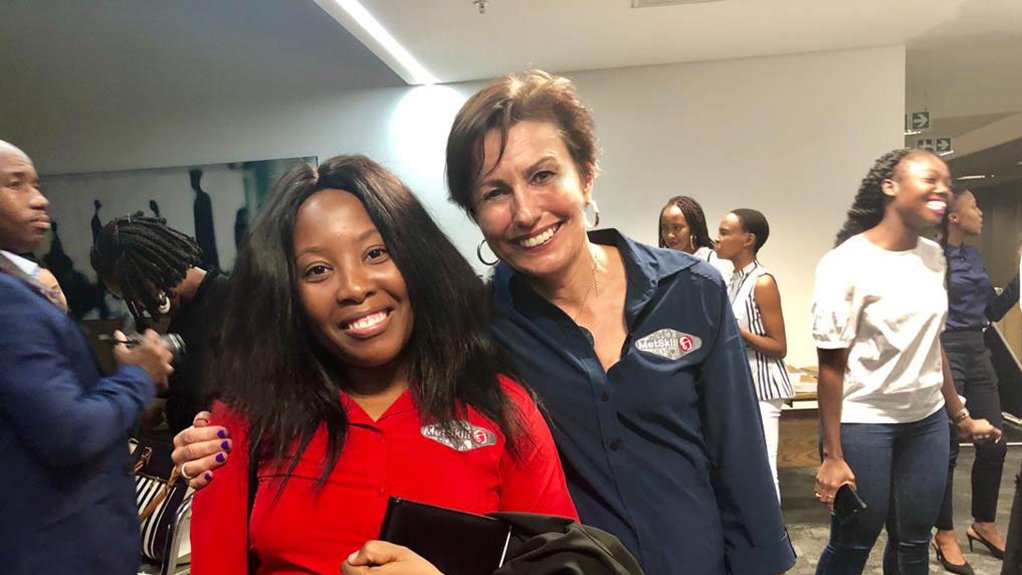 An image depicting two smiling women, Rebecca Sands and Masego Modise
