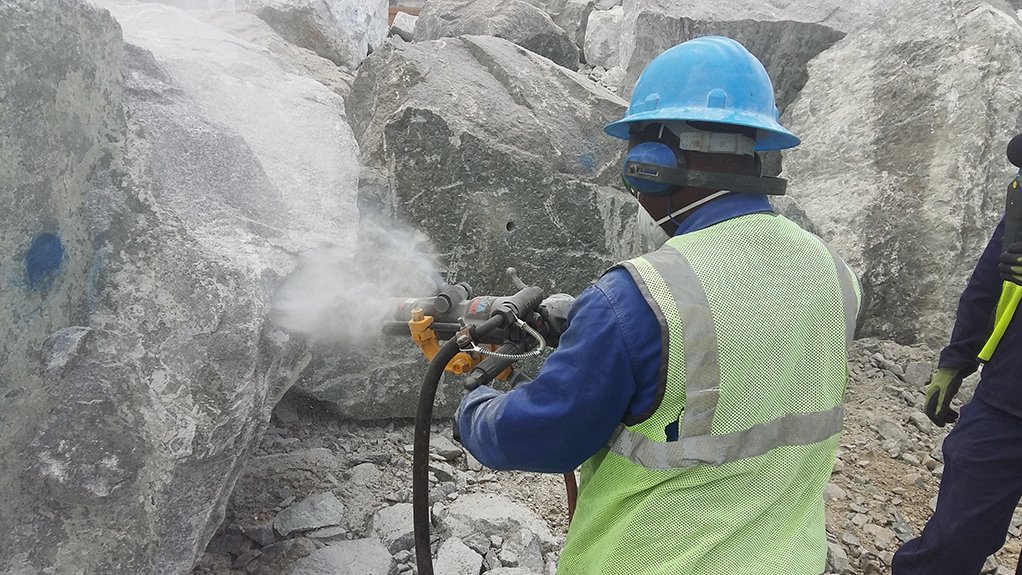 Image of a worker conducting surface drilling 2