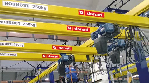 A row of Donati hoists at a manufacturing plant