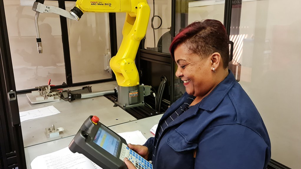 An image of a women at SAIW's robotic welding training