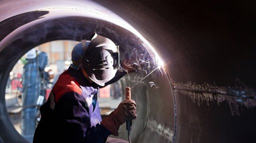An image of a welding apprentice