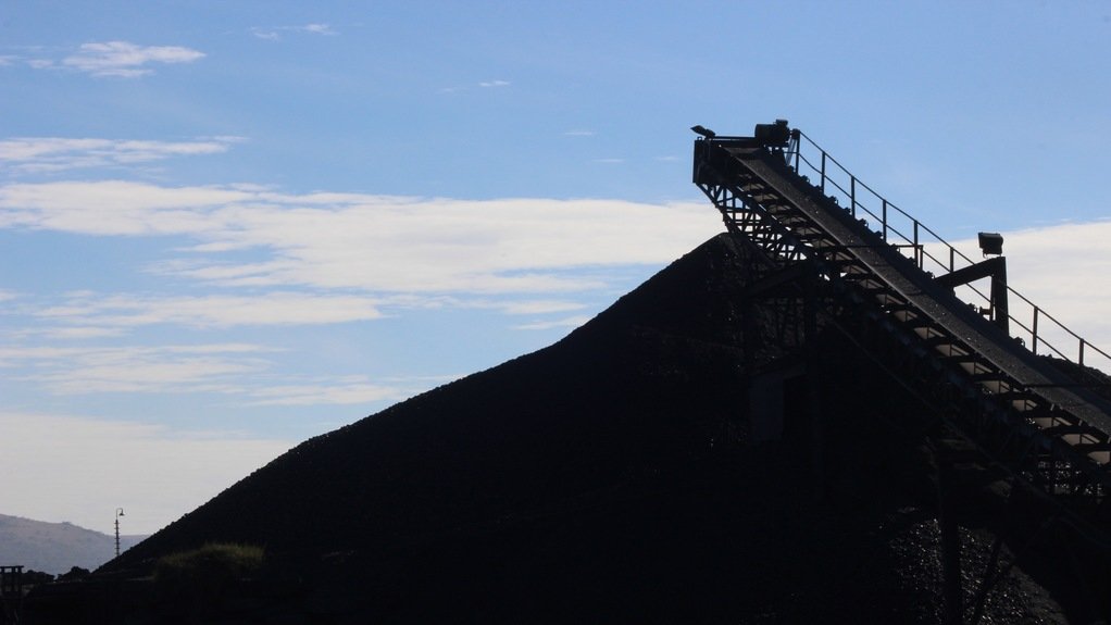 Coal stockpile and conveyor silhouette