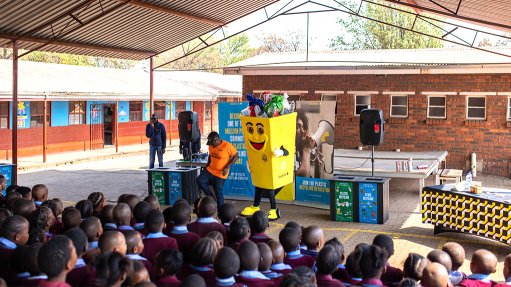 Polyco staff teach school children about the importance of recycling