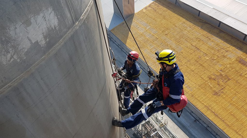 An image depicting two men conducting a rope access inspection