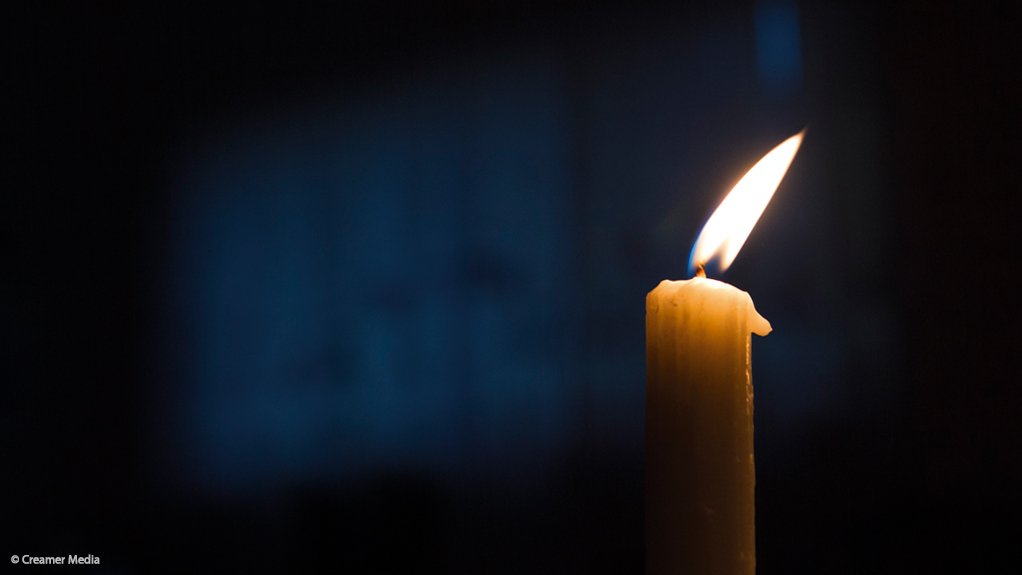 Photo of a lit candle