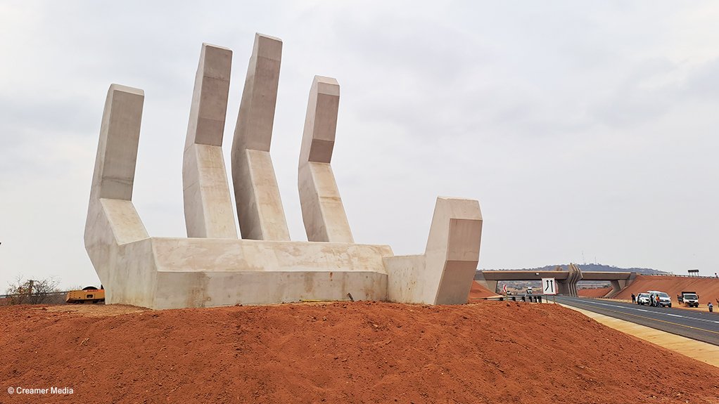 An image of a full hand sculpture along the Musina Ring Road project 
