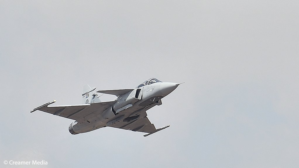 An image of an airborne Saab Gripen C