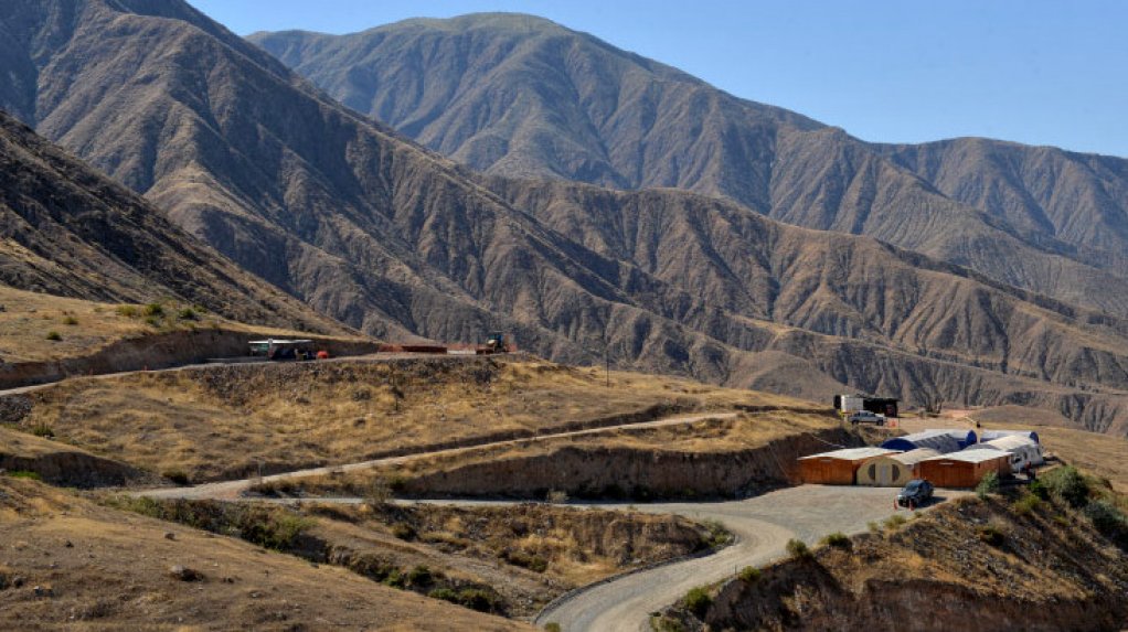 An image of a project site surrounded by mountains 