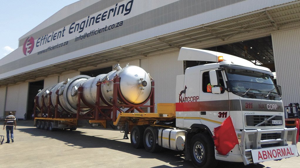 Column loaded on a truck outside a factory