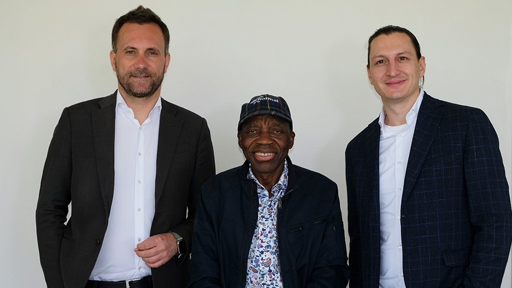 Mitochondria founder and CEO Mashudu Ramano (centre) is flanked by Juergen Rechberger, VP business field leader, hydrogen & fuel cell, AVL (left) and Bernd Reiter, lead engineer SOFC system architecture,  AVL, (right).