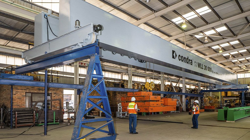 MMC’s crane under load test at Condra’s Germiston factory. The special paint finish is MMC Grey, a corporate colour
