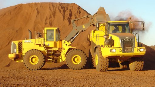 Image of two construction vehicles on a mine to show that Collision avoidance systems help make surface mining safer