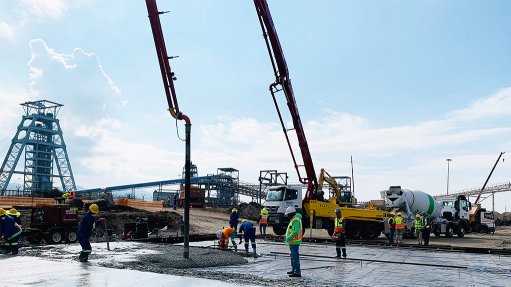 Image of concrete being layed on construction site 