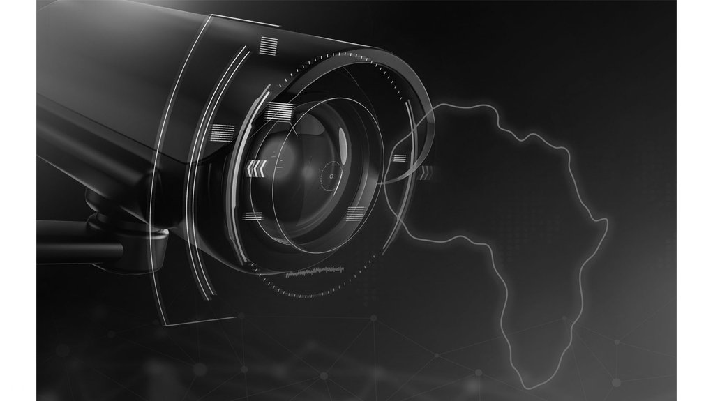 Image of a camera  lens focussed on map of Africa