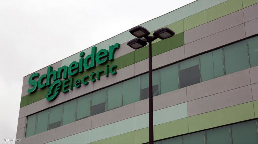A photo of Schneider Electrics Building and company logo
