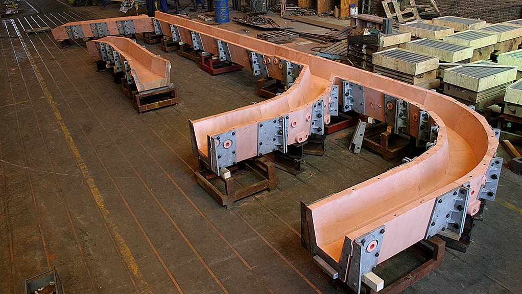 An image of a copper furnace being built