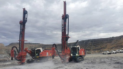 Two drill rigs working on an opencast gold operation in Namibia