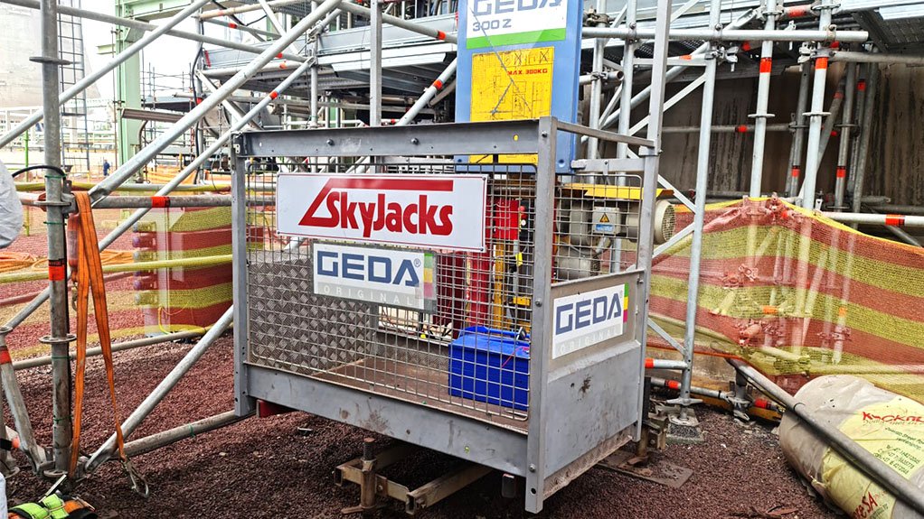 A construction hoist on a working construction site.