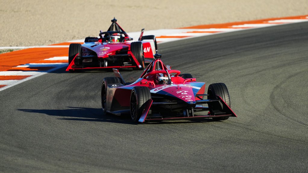 An image depicting a red Formula E race car