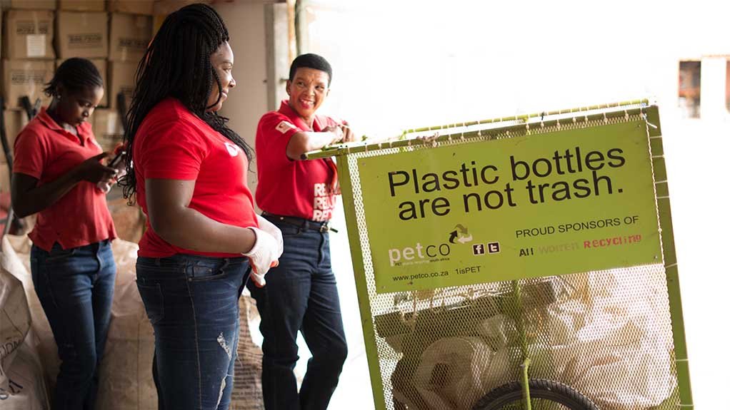 An image showing buy-back centre owner Loretta Waterboer (far right), pictured with colleagues Elida Masala and Suzanne Frederick (far left) 